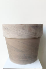 The standard clay garden 12" pot in dark basalt as viewed from the side.