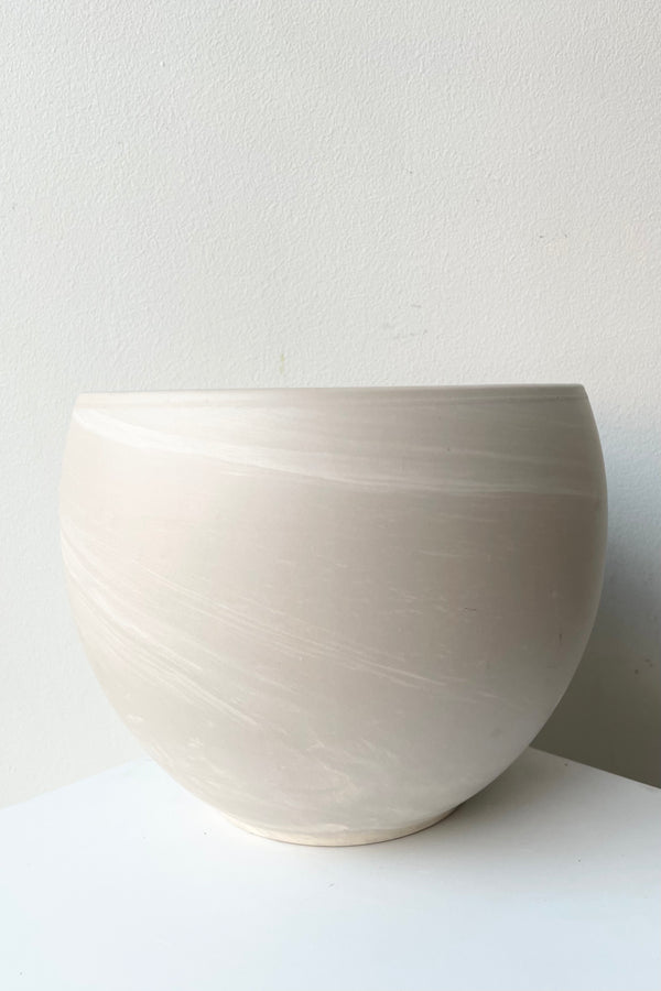 Luna sphere pot in granite shown from the side