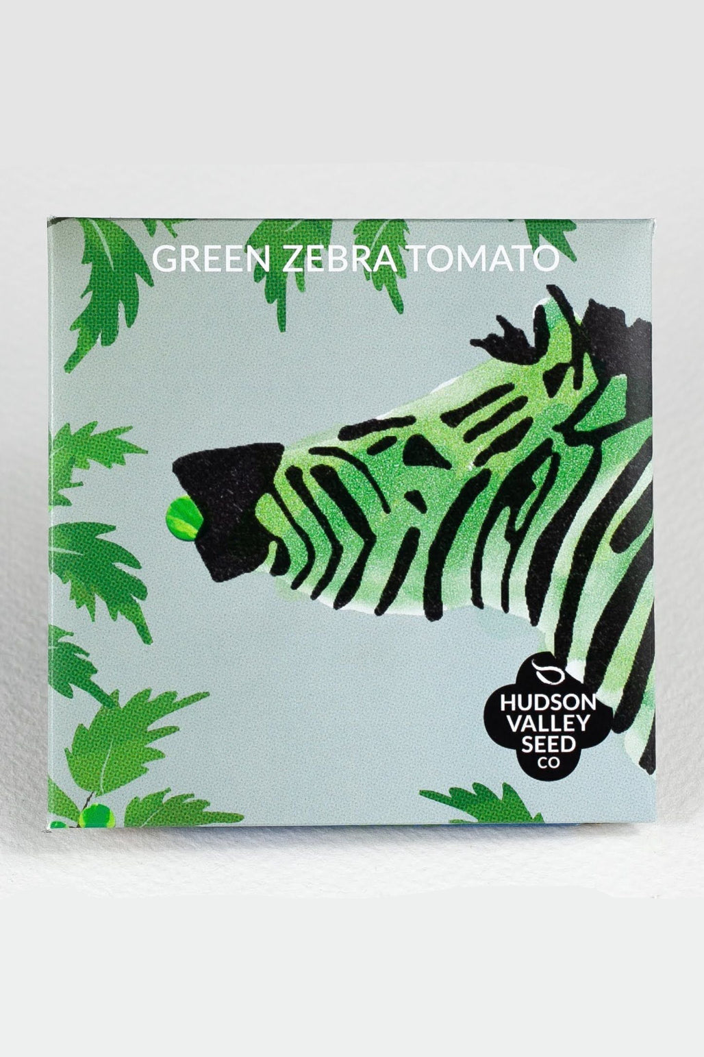 Seeds packaging for Green Zebra Tomato with zebra illustration and Hudson Valley Seed Co logo. ©Hudson Valley Seed Co.