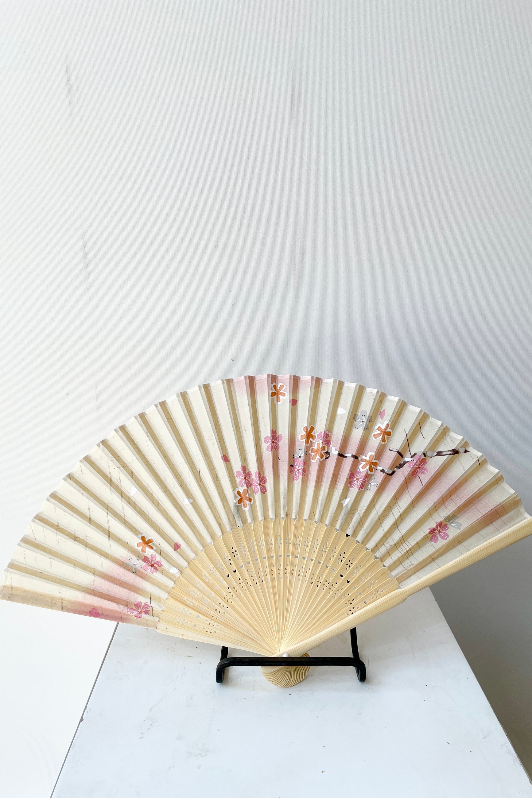 The White and Pink cherry blossom silk fan at Sprout Home.  ©Sprout Home