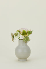 Gray Essential Vase with some stems in it by Hawkins New York. 