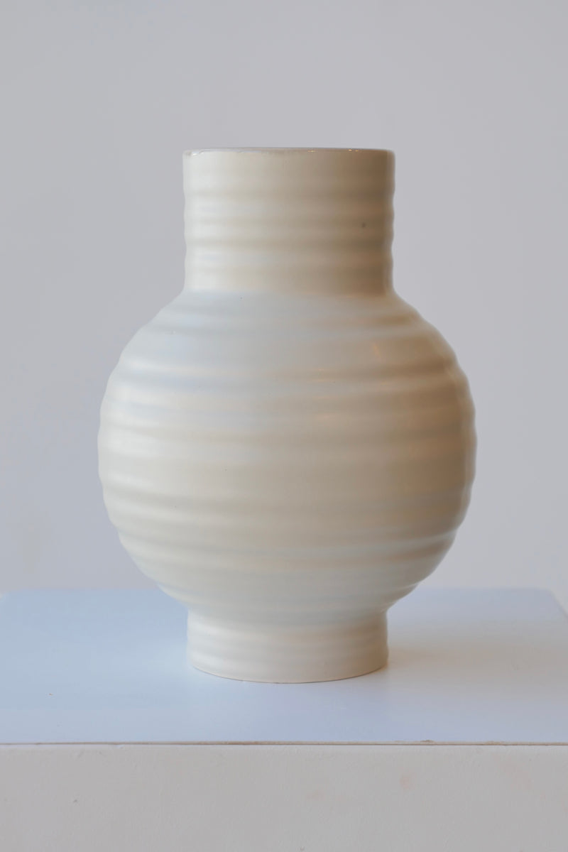 Essential Light Grey ceramic vase by Hawkins, viewed at eye level. 
