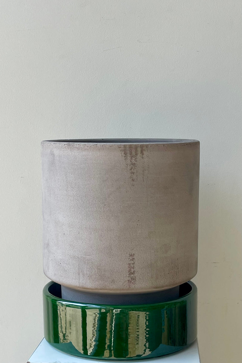 Grey and emerald 9.8 inch Hoff Pot by Bergs Potter on a white surface in a white room