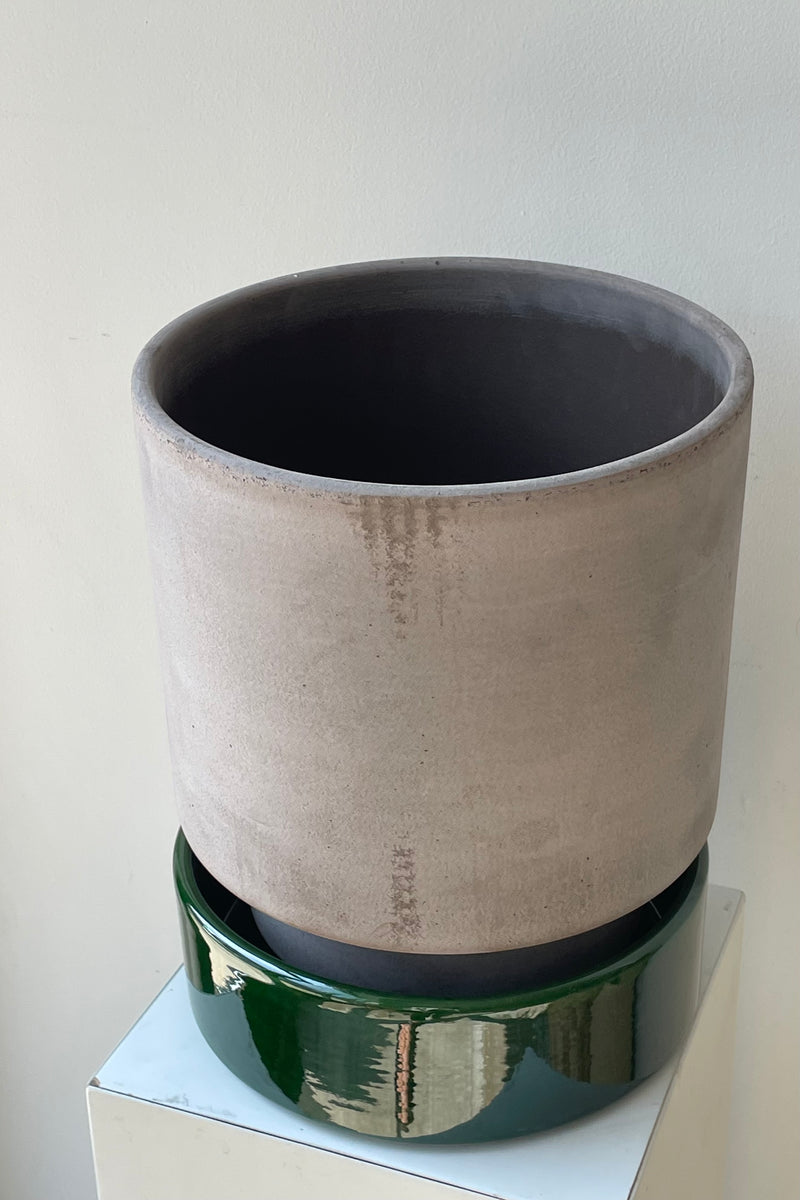 Grey and emerald 9.8 inch Hoff Pot by Bergs Potter on a white surface in a white room