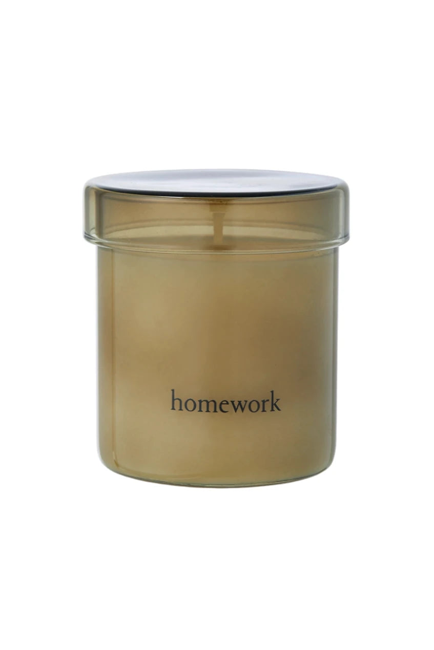 Homework Candle Outside of its packaging on a white background