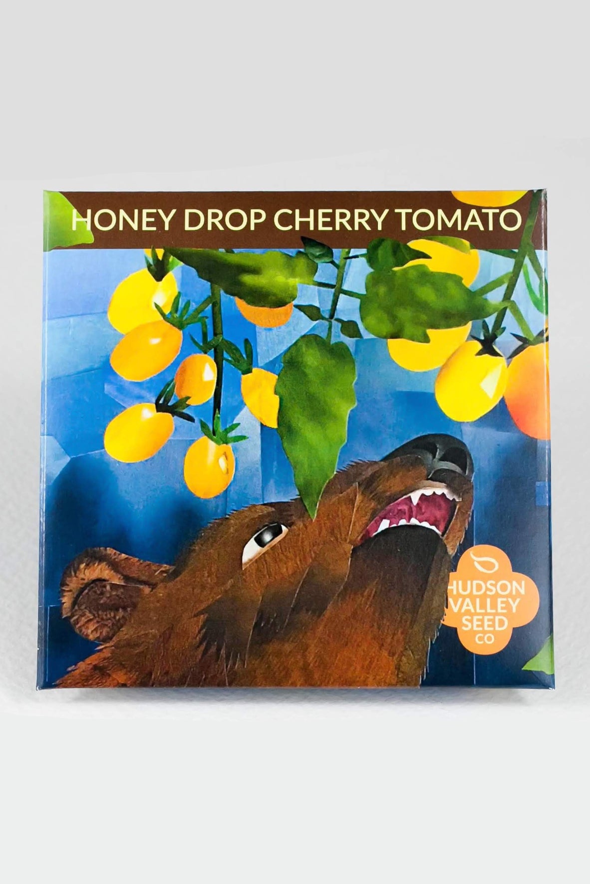 Honey Drop Cherry Tomato seed packet with a horse illustration and Hudson Valley Seed Co. branding. ©Hudson Valley Seed Co.