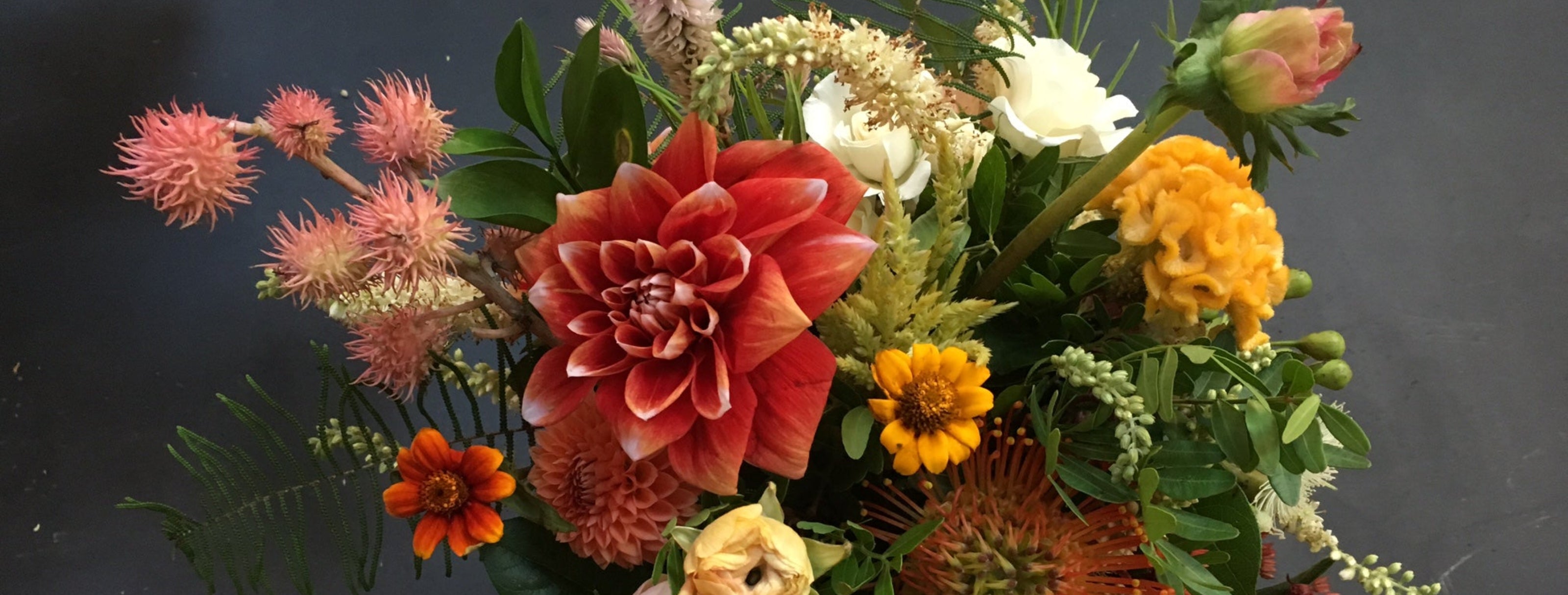 Bouquet of colorful flowers on a dark background