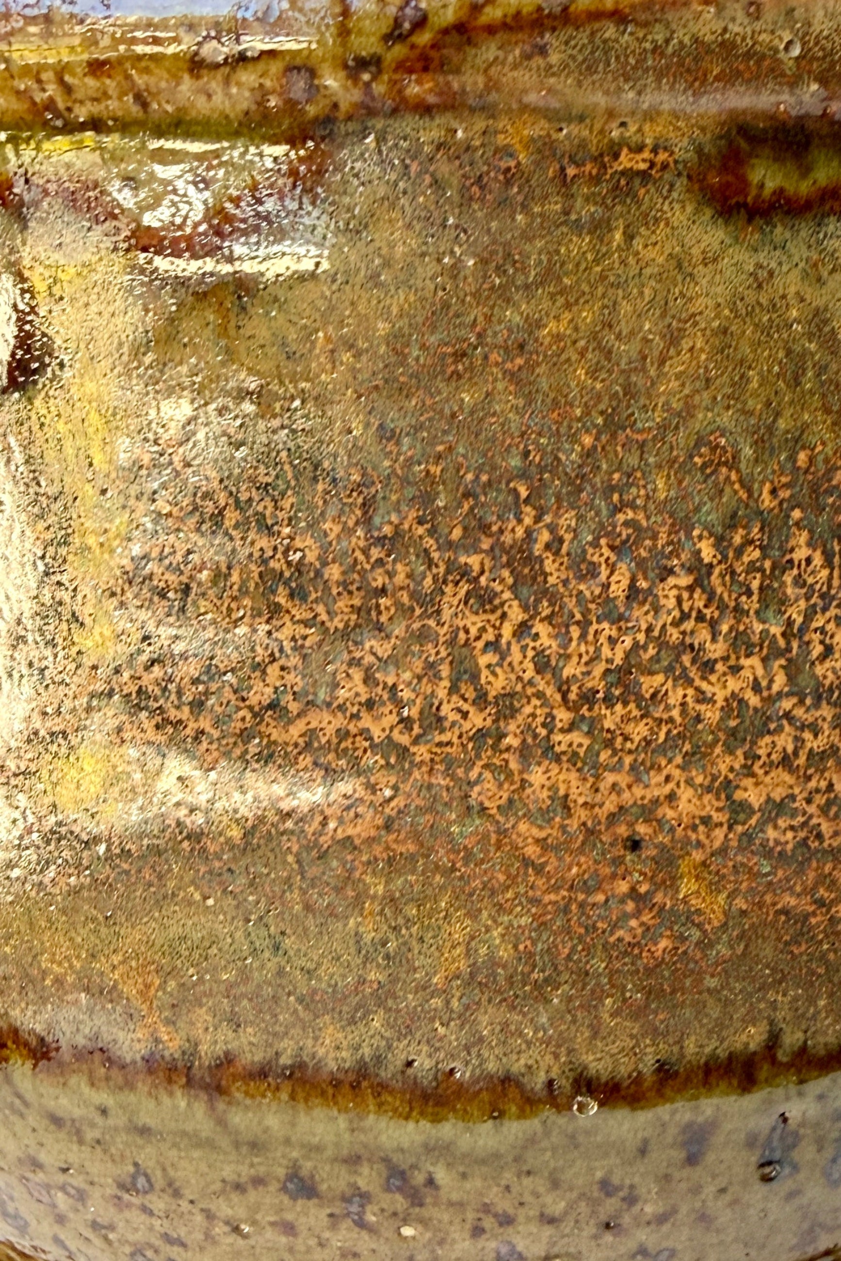 close up of a Bruning pot in an Army Green with Yellow speckled glaze  ©Sprout Home