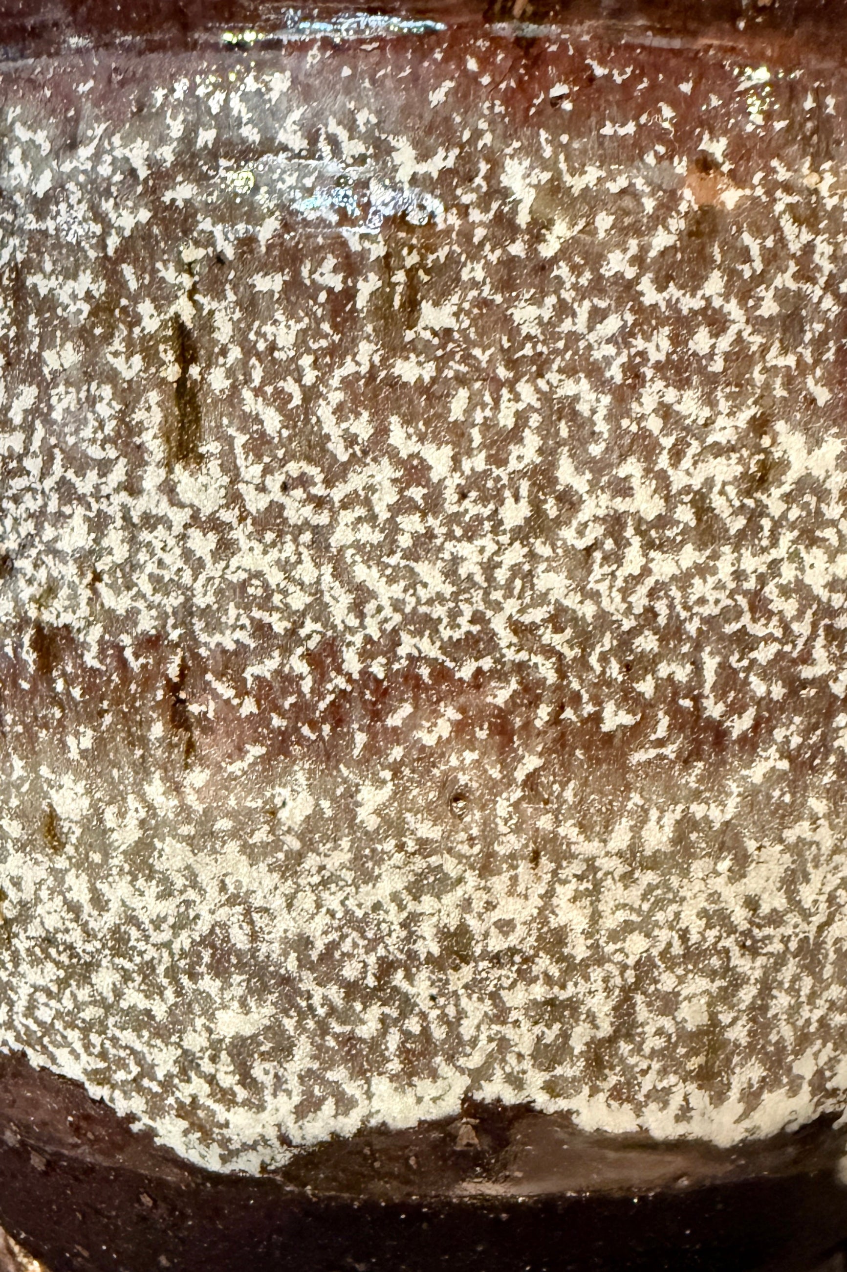 Close-up of a brown with white textured Glazed ceramic from Bruning Pottery ©Sprout Home