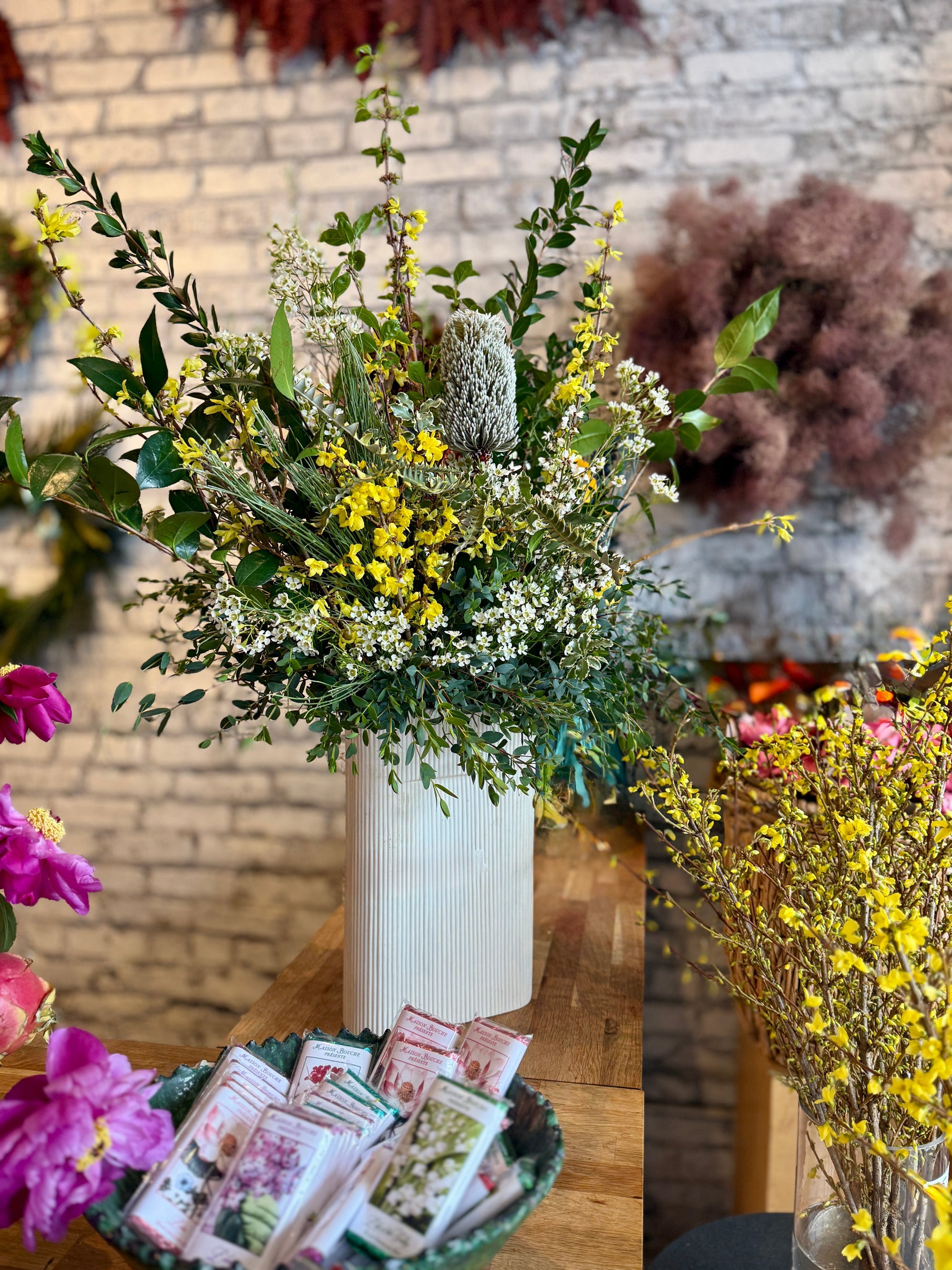 One of the counters at Sprout Home Floral with an arrangement on it ©Sprout Home