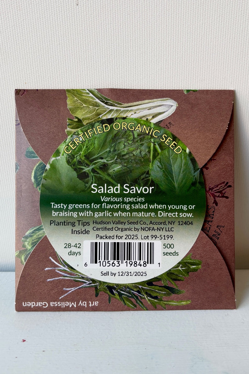 Backside of seed pack for Salad Savor Mix against a white background