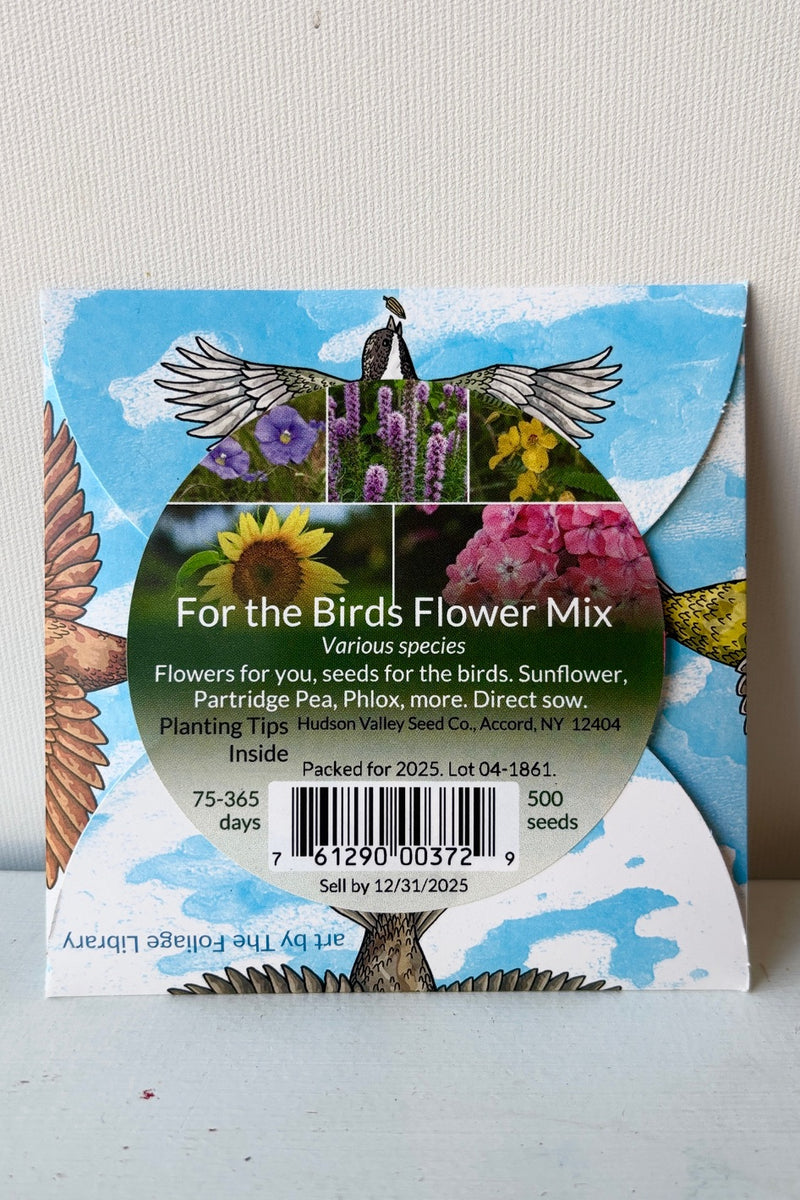 Backside of For The Birds Flower Mix seed pack against a white background