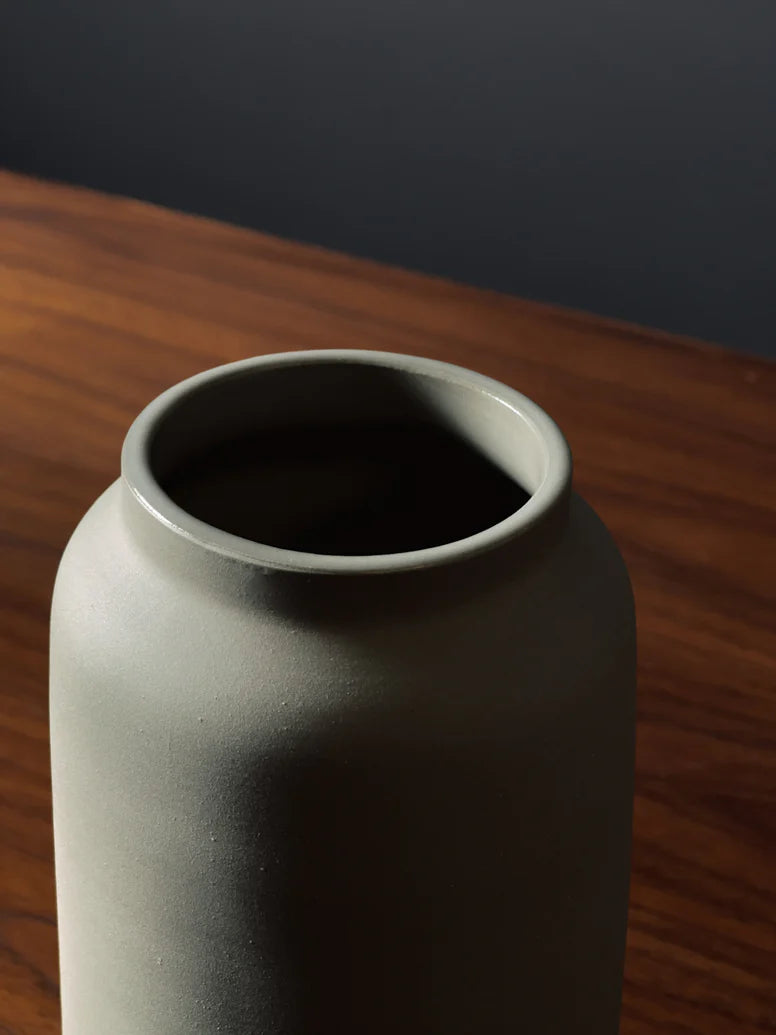 The forest green Bouquet vase by L'Impatience showing the lop of the vase. 