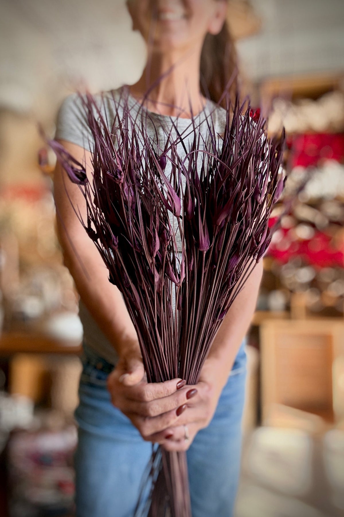 Capin Stella Violet Color Preserved Bunch at Sprout Home Floral held in hand ©Sprout Home