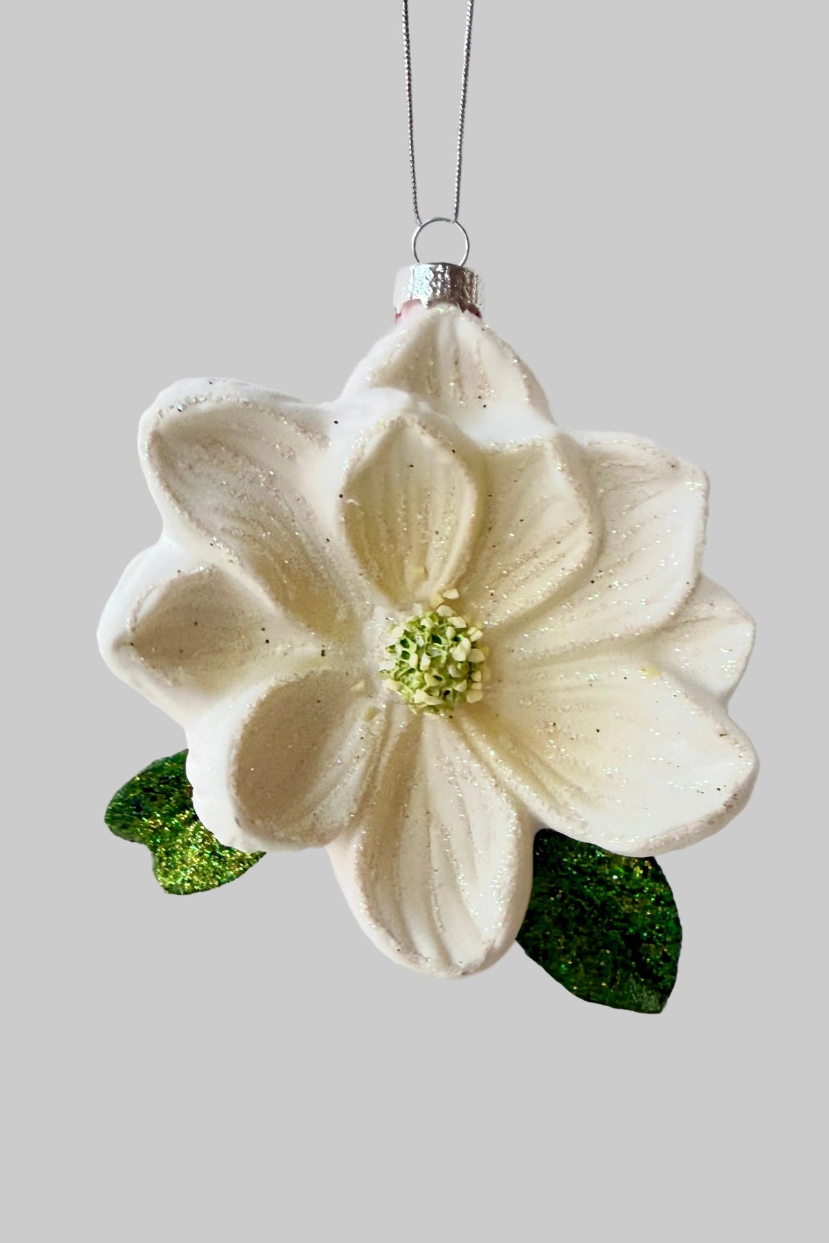 Southern Magnolia Ornament against a grey background ©Sprout Home