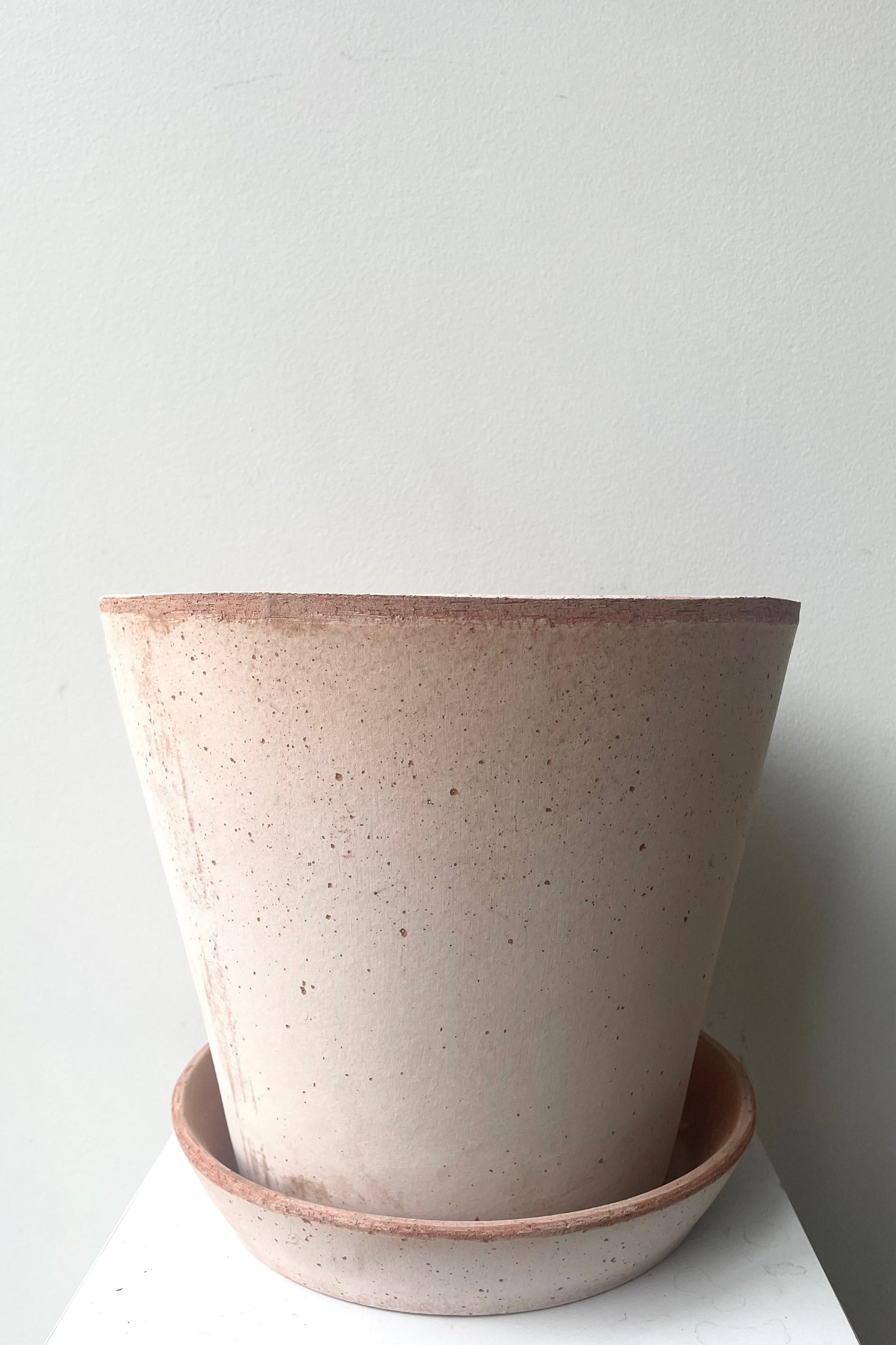 A full frontal view of Julie Pot & Saucer rosa 9.8" against white backdrop ©Sprout Home 