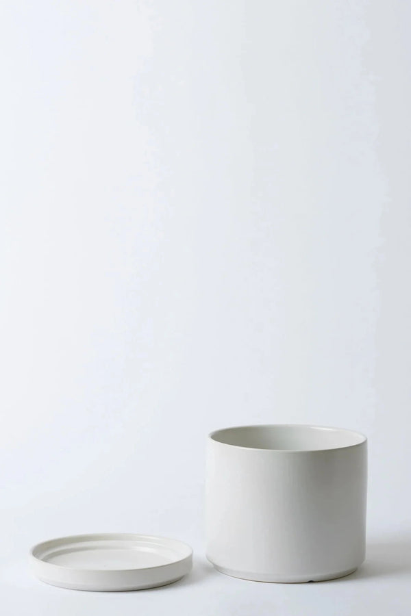 LBE Design Solid Goods Cylinder w/ saucer in white with the saucer and pot separated.