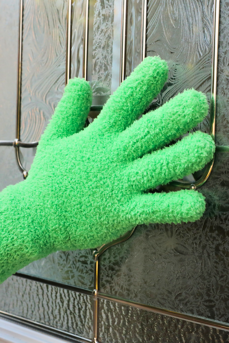 green microfibre gloves in use.