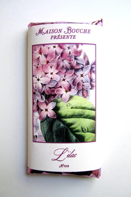 Chocolate bar with floral design and 'Maison Bouche' branding on a white background ©Maison Bouche