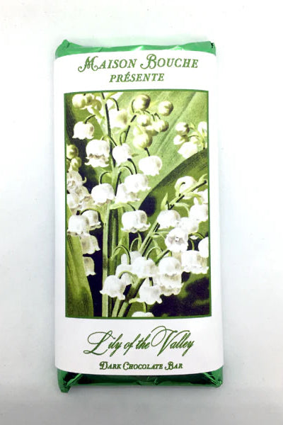 Maison Bouche dark chocolate bar packaging with lily of the valley design on a white background ©Maison Bouche