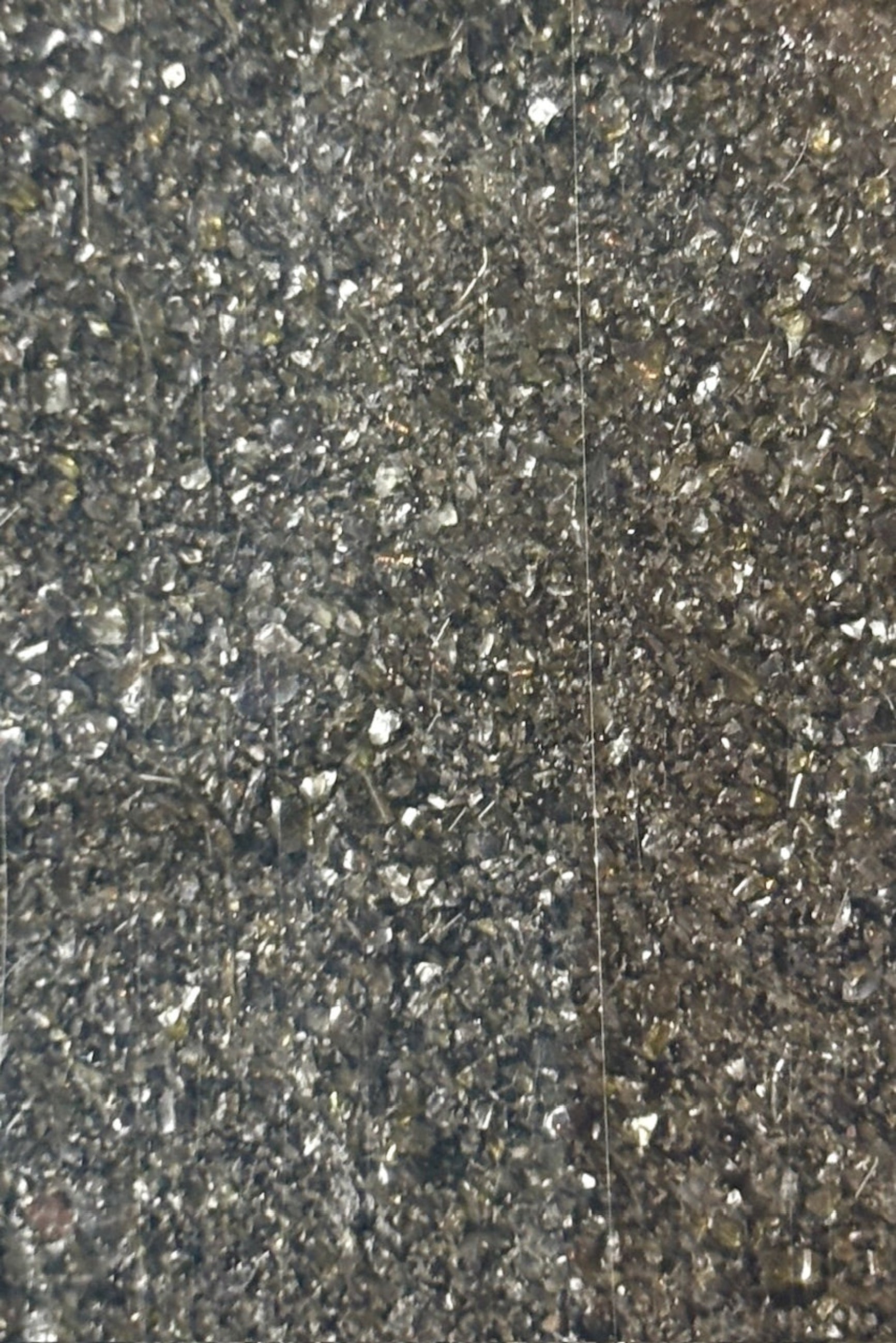 Close up of Mosser Lee black sand inside bag ©Sprout Home