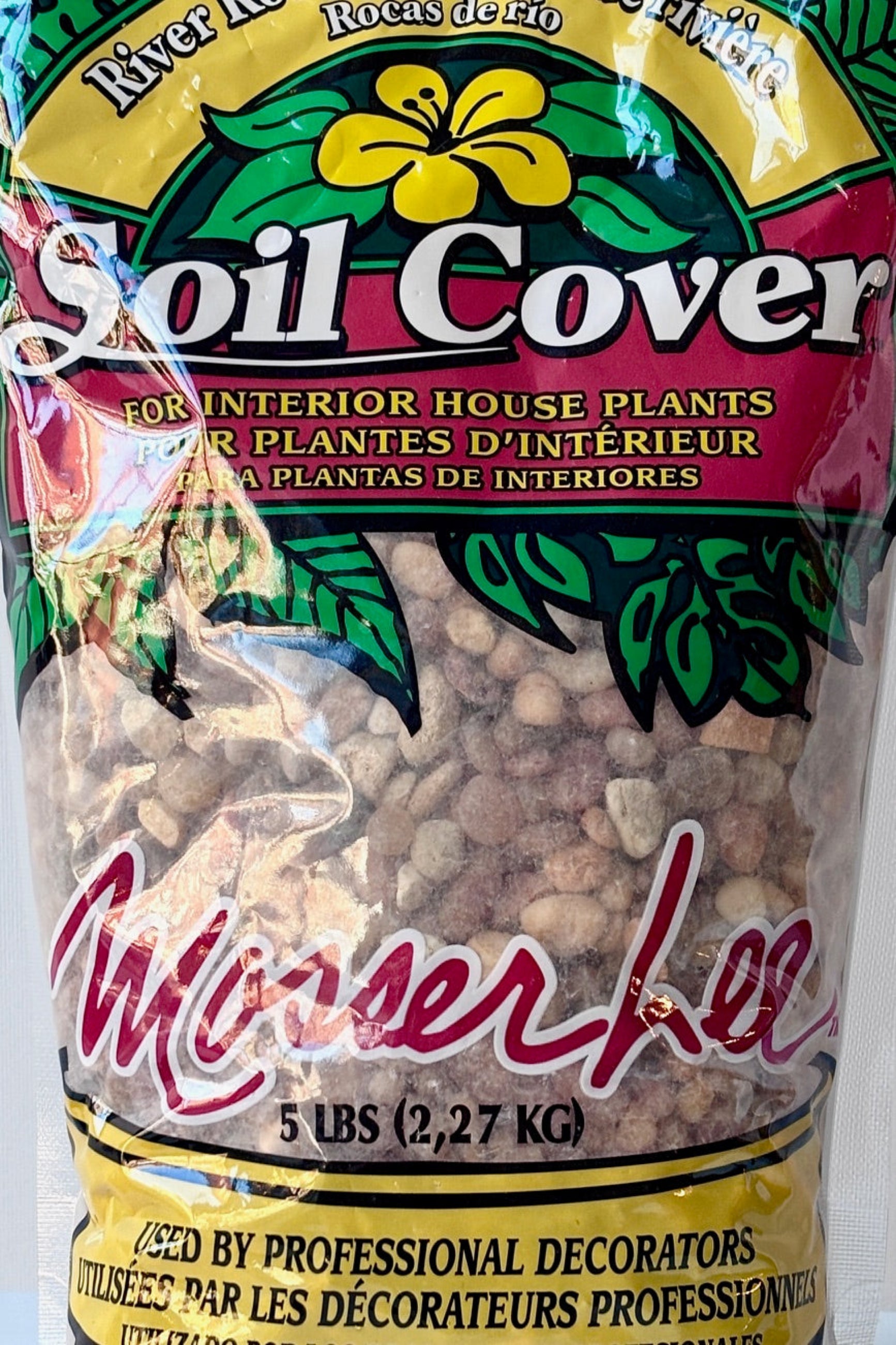 Close up of decorative river rock gravel for soil coverage or terrariums ©Sprout Home