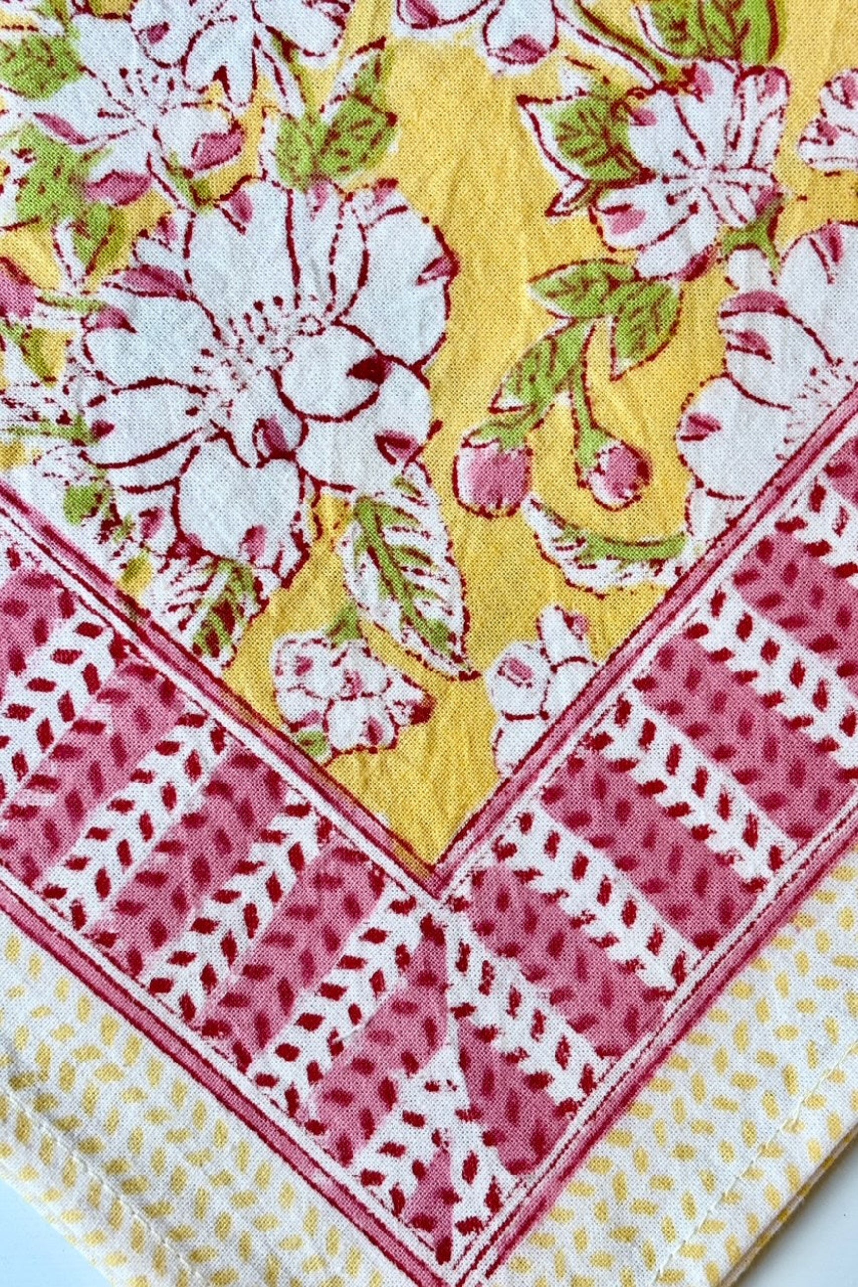 Hand printed, 100%cotton, Camelia yellow and pink floral print napkin ©Sprout Home 