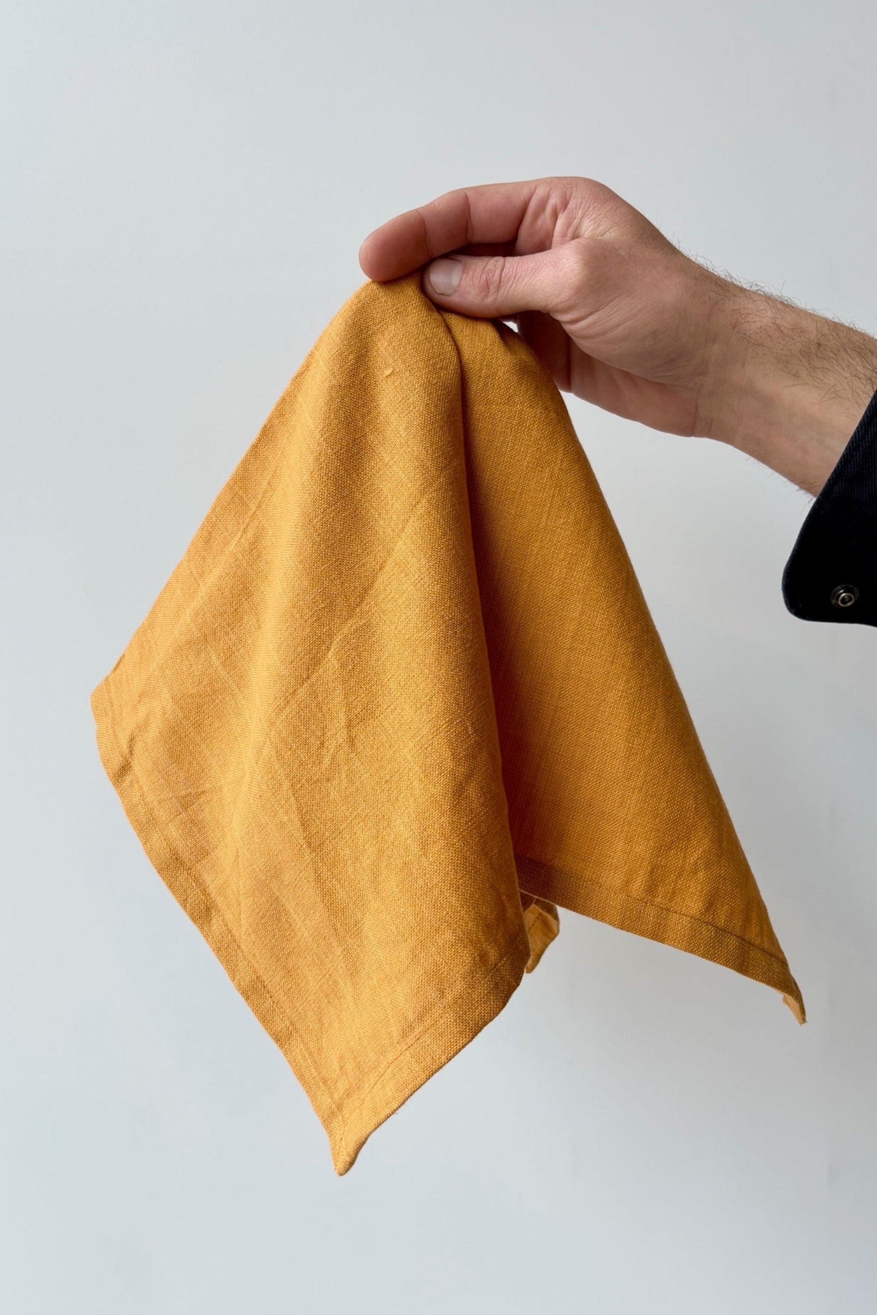 100% cotton, homespun, handwoven napkin in color sand against a white backgound ©Sprout Home