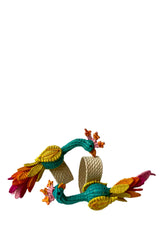 Photo of a pair of peacock napkin rings shown against a white background.