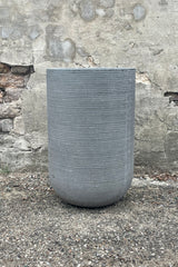 Cody High Pot horizontal ridged dark grey medium against a grey wall