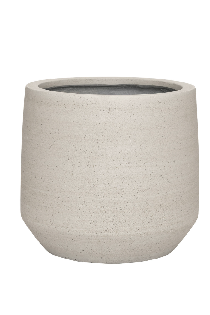 A beige ficonstone planter shown from the front with a white background ©Pottery Pots