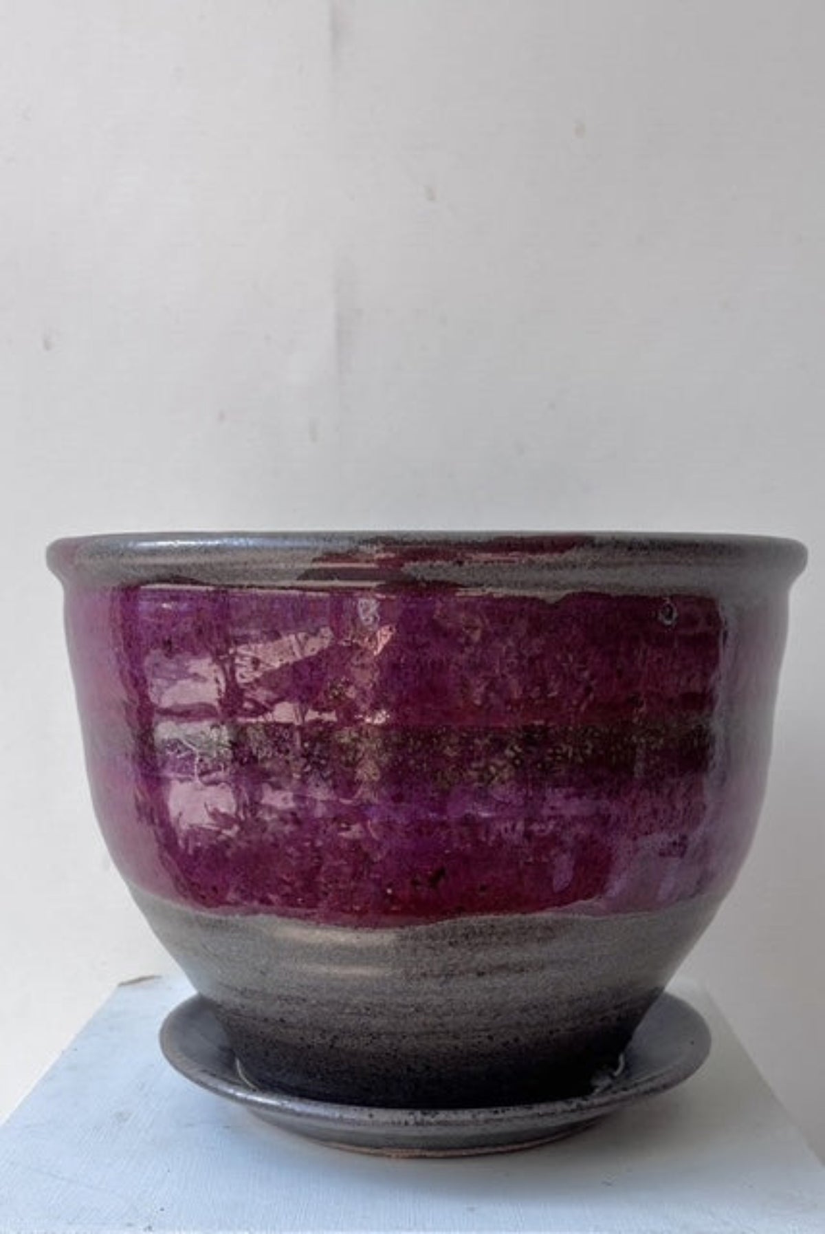 Moss and lilac planter with drainage against a white background ©Sprout Home 