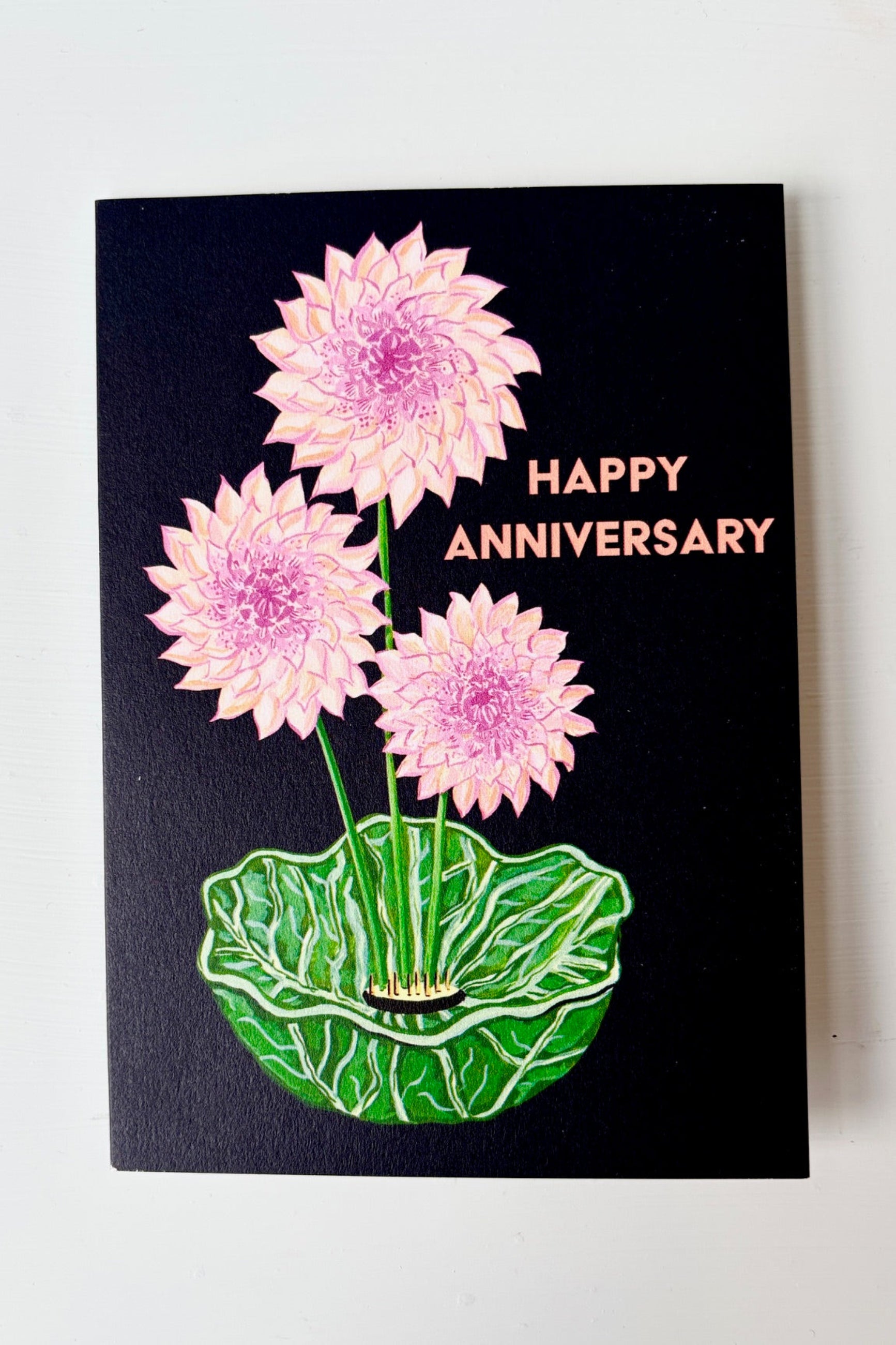 Happy Anniversary greeting card with pink dahlias displayed in a green bowl on a black background ©Sprout Home