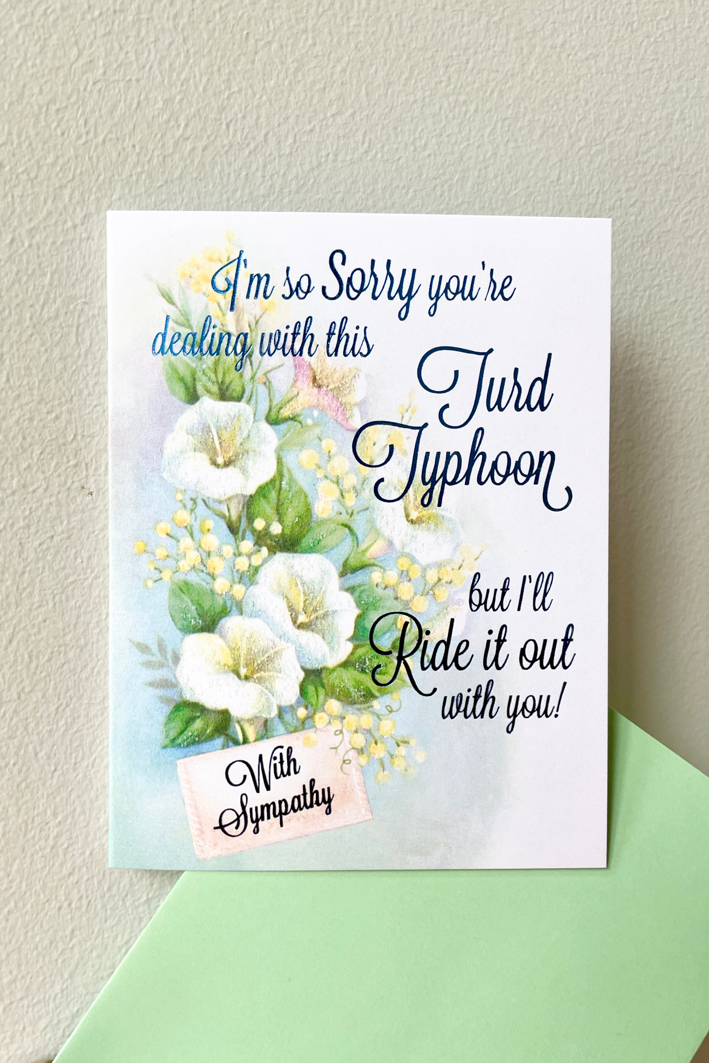 Turd Typhoon sympathy card with blue foil and green envelope