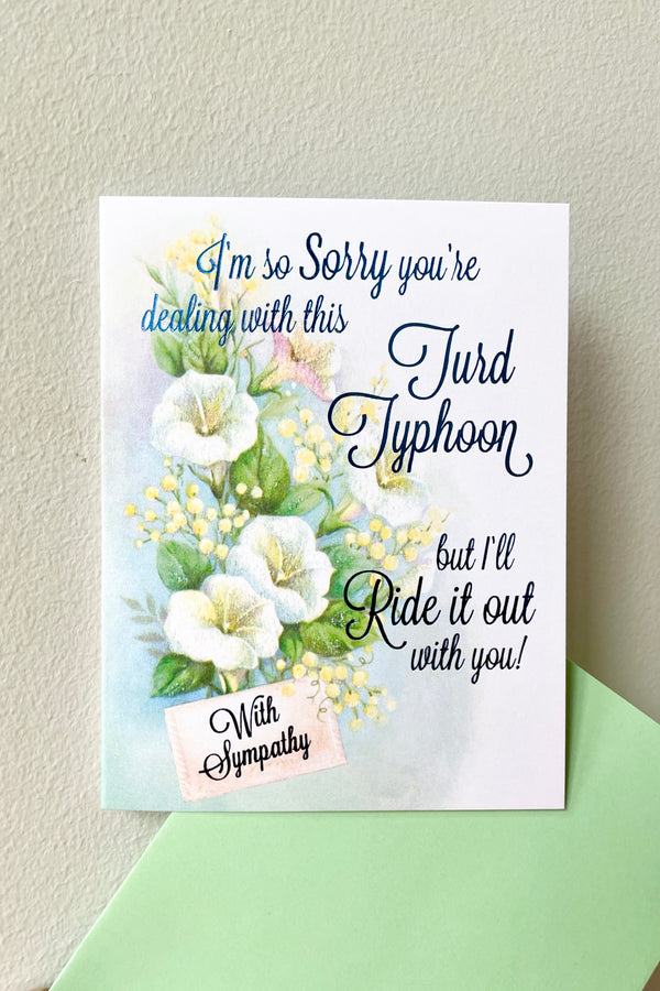 Turd Typhoon sympathy card with blue foil and green envelope