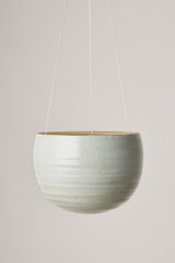 Spherical Hanging Planter
Grey Crackle by Angus & Celeste hanging empty against a white wall. 