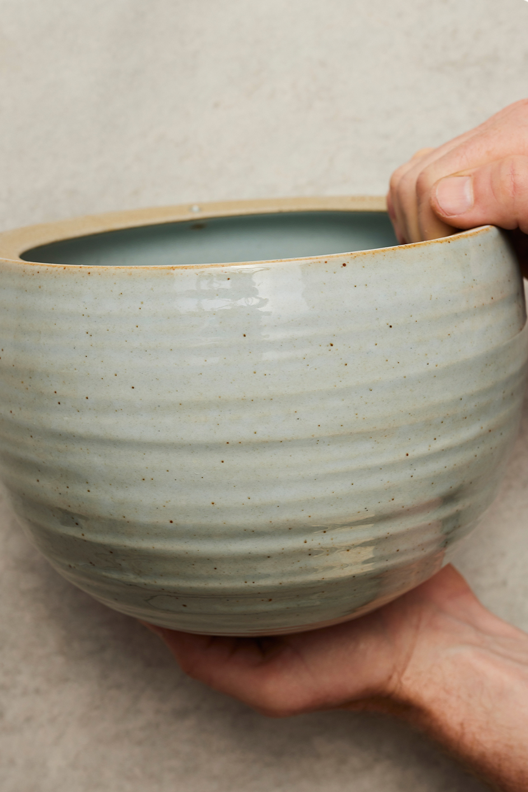 Spherical Hanging Planter
Grey Crackle by Angus & Celeste in hand showing of the details of the glaze.