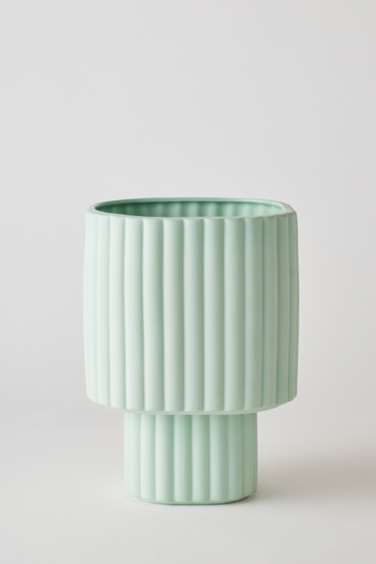 A Mint Modular Stack Planter by Angus & Celeste shown empty and against a white wall. 