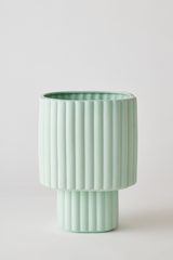 A Mint Modular Stack Planter by Angus & Celeste shown empty and against a white wall. 