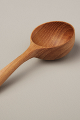 the Cup part of the teak round scoop showing the wood grains