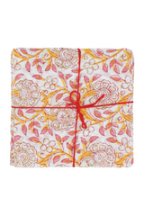 Suzette Frangipanier Jaipur napkins folded and tied with a red string