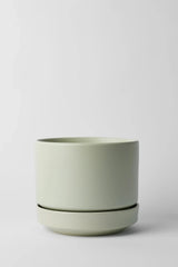 LBE Design Revival Ceramics Round Two Mint planter shown from the side empty.