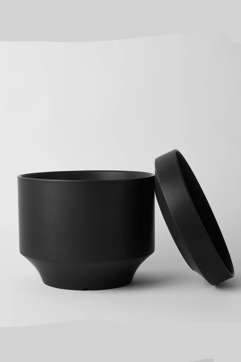 Black Round Two nceramic pot with lid on a light gray background ©Revival Ceramics