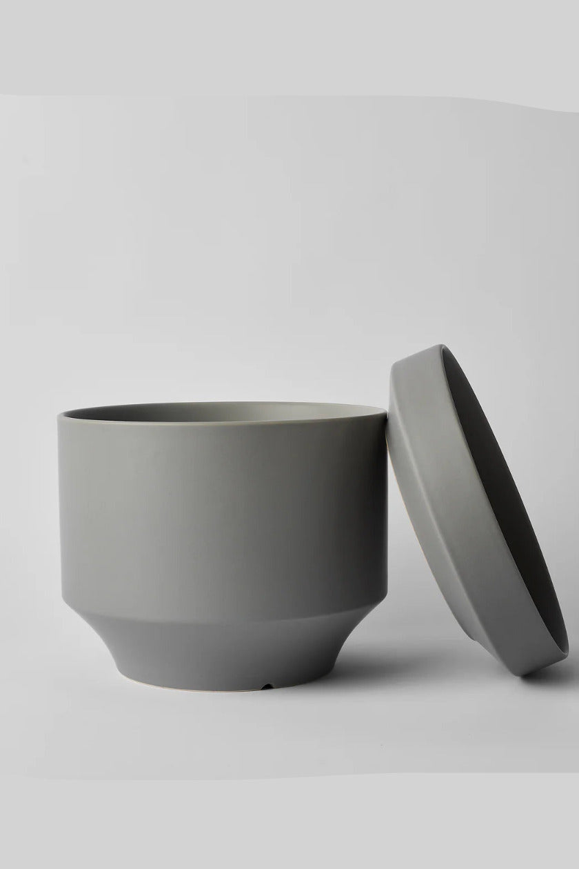 Round Two Gray ceramic pot with lid on a light gray background ©Revival Ceramics