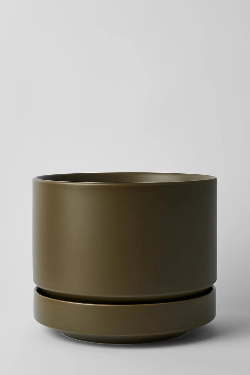 LBE Design Round Two Olive planter against a white grey backdrop.