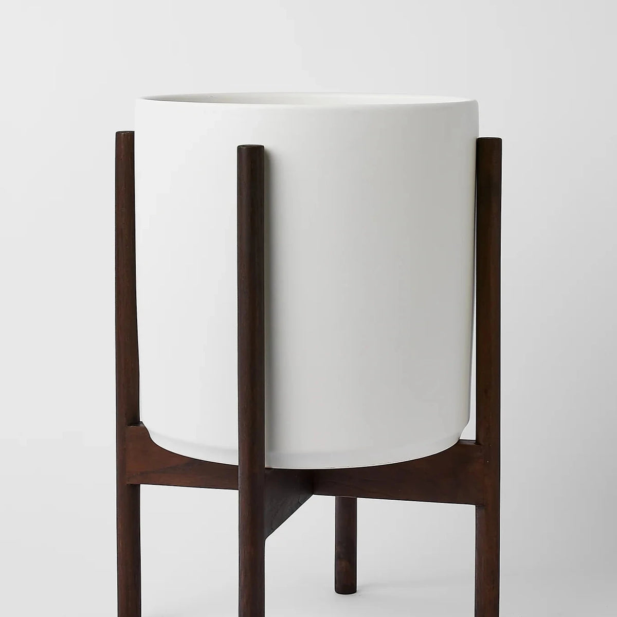 white plant pot with black stand The 10" White Cylinder & Dark Teak Stand