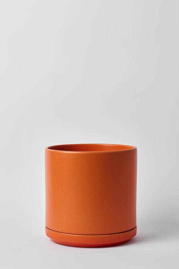 LBE Design Rust colored Solid Goods Cylinder and saucer, empty