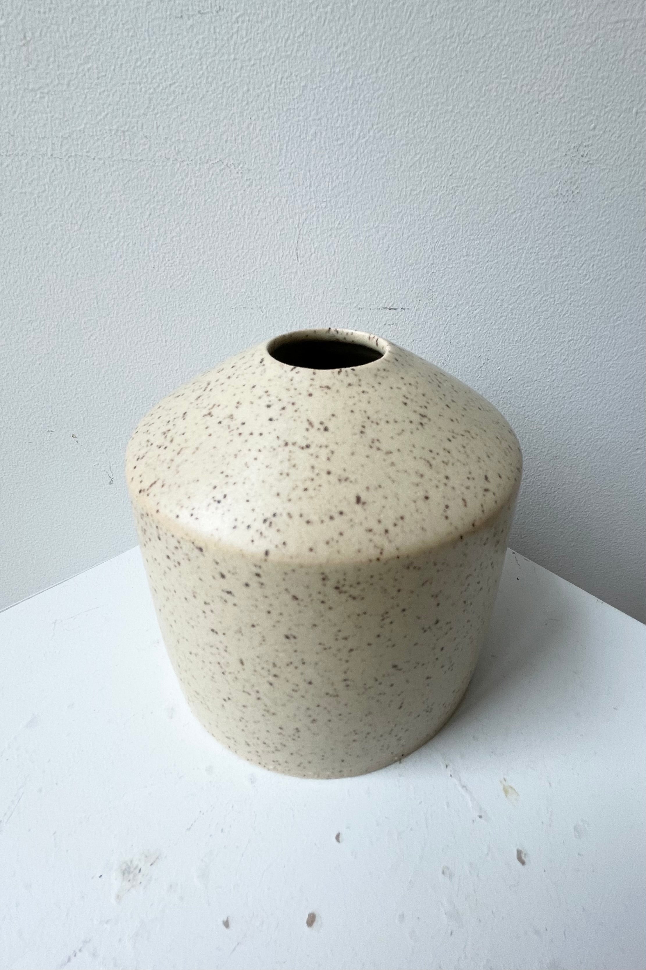 Siros vase in butter Speckle shown from above side showing the opening diameter.