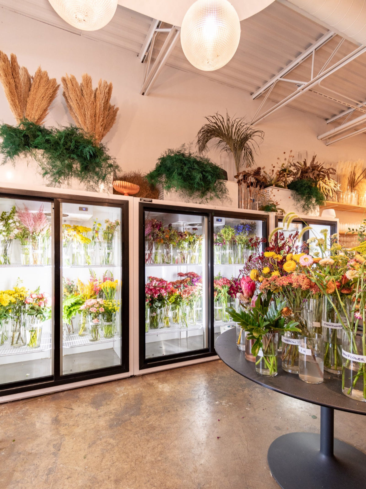 The floral fridges and vases of cut floral on display at Sprout Home Floral in Chicago