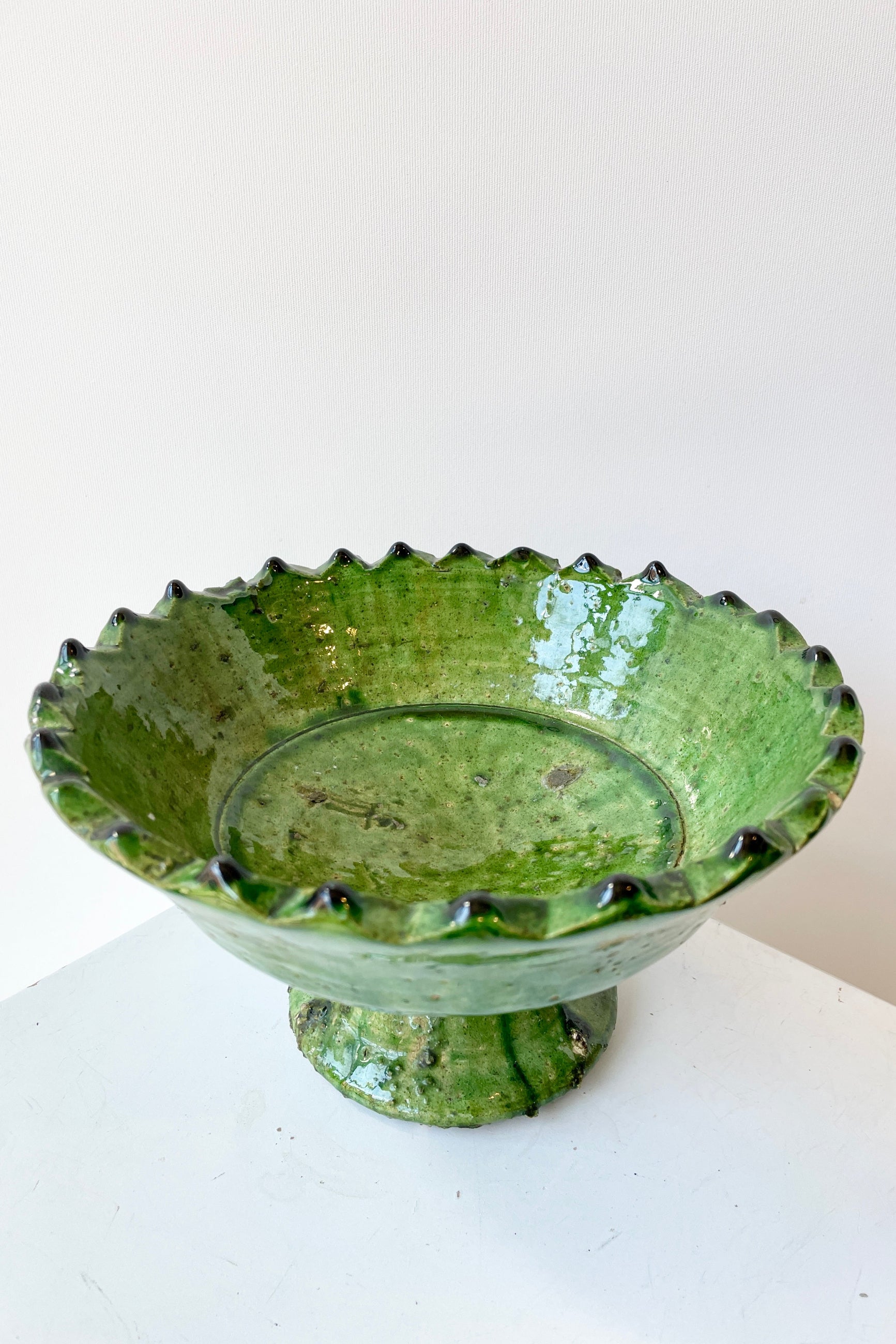 Small Tamegroute green compote shown from the topside looking in.  ©Sprout Home